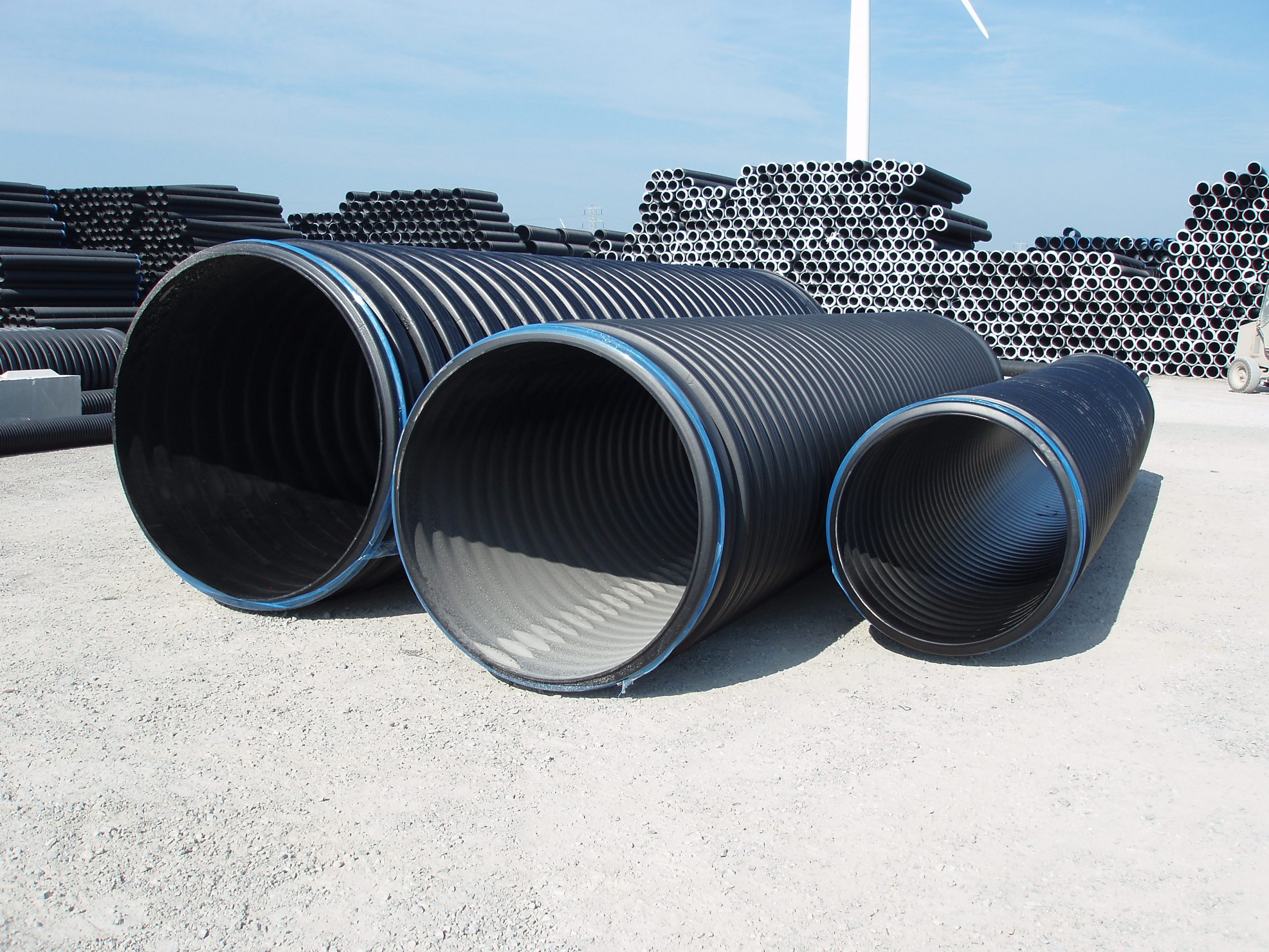 A photo of a row of high density polyethylene pipe