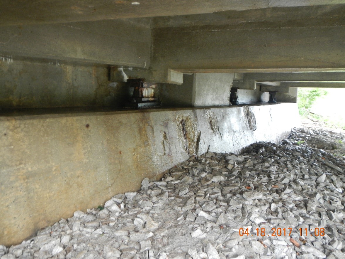 Concrete abutment after debris removal, cleaning and washing