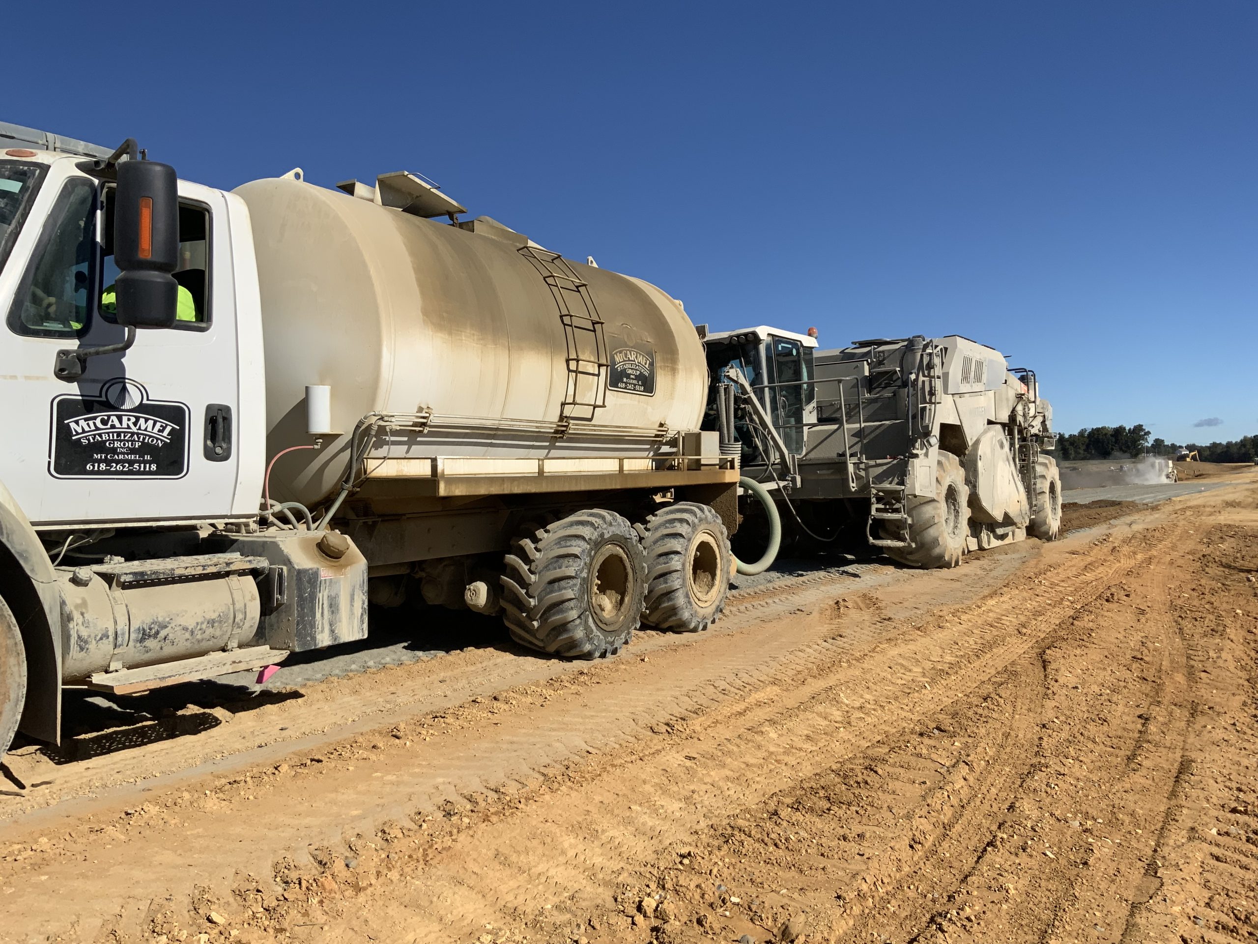 Figure 10 Stabilizing Subgrade equipment mixing stabilizing materials into soil subgrade